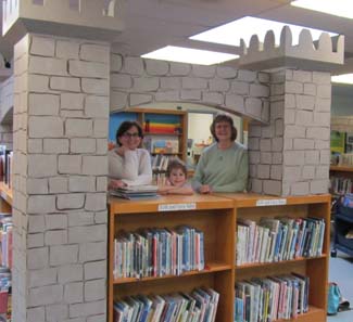 librarians standing in a school library